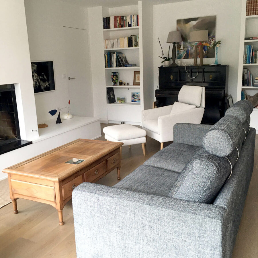 Aménagement d'un espace salon avec un fauteuil et un canapé Sits